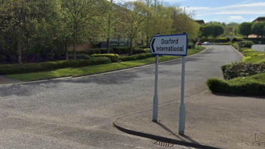 A road sign for Doxford International.