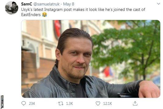 Twitter user Samuelatruk posts a picture of Oleksandr Usyk with the caption: "Usyk's latest Instagram post makes it look like he's joined the cast of Easternders" - Usyk is looking at the camera whilst leaning up, with terraced houses in the background.