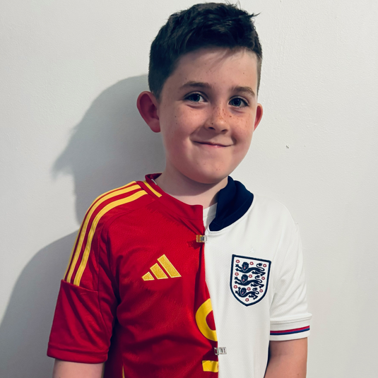 Edward wearing his combined Spain and England football shirt