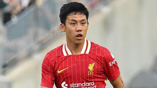 Wataru Endo in action for Liverpool.