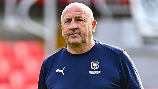 John Coleman looks on from the sidelines