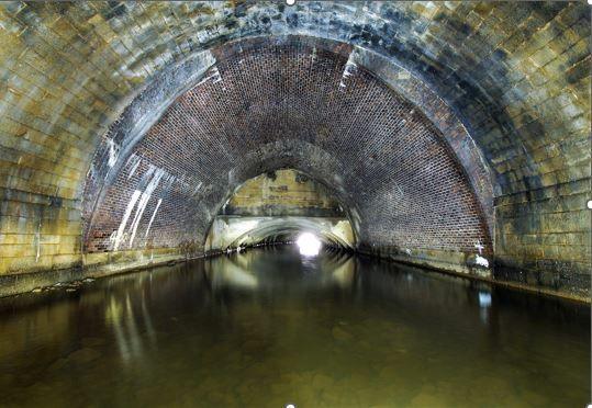  Culvert in brick and stone, in the mid-distance the crumbling concrete section