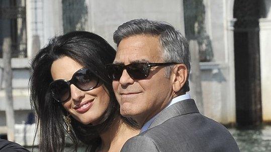 George Clooney and his fiancee Amal Alamuddin arrive in Venice, 26 September