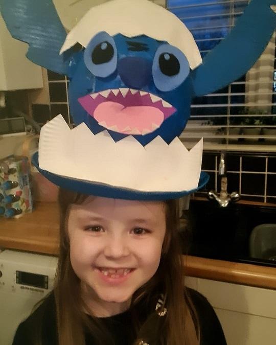 Girl in Stitch hat.