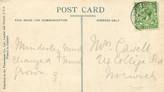 The writing on a post card sent by Edith Cavell. In a message written in pencil it says, "Mundesley much changed & much grown". 