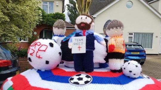 A postbox topper dedicated to England at the Euros