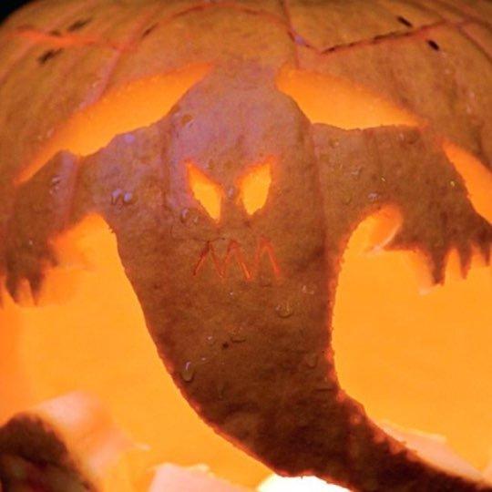 Ghost carving pumpkin