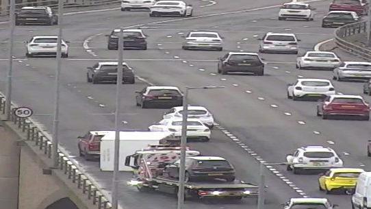 CCTV still showing an overturned trailer on the Kingston Bridge in Glasgow