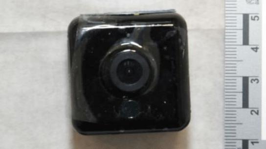 A small square black camera