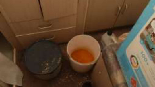 Two buckets in the caravan, one with frozen eurine in