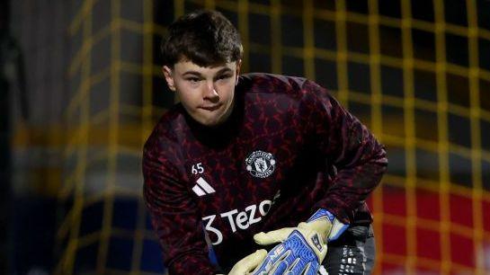 Goalkeeper Tom Myles in action for a Manchester United academy side