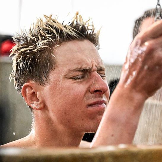 Tadej Pogacar showers after Paris-Roubaix