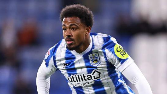 Josh Koroma in action for Huddersfield