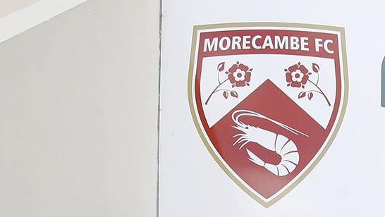 Morecambe's crest at the Mazuma Stadium home