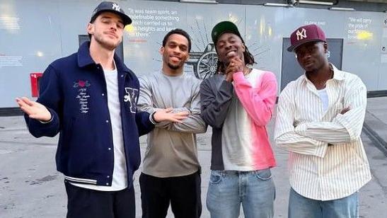 Eberechi Eze with fellow Arsenal players outside the Emirates