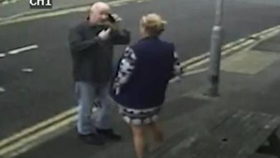 Stephanie Langley and Matthew Bryant on a pavement facing each other