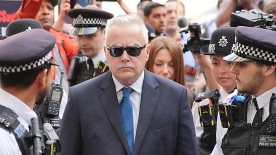 Huw Edwards arriving at court