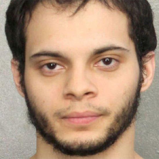 Police photo of Esteban Santiago