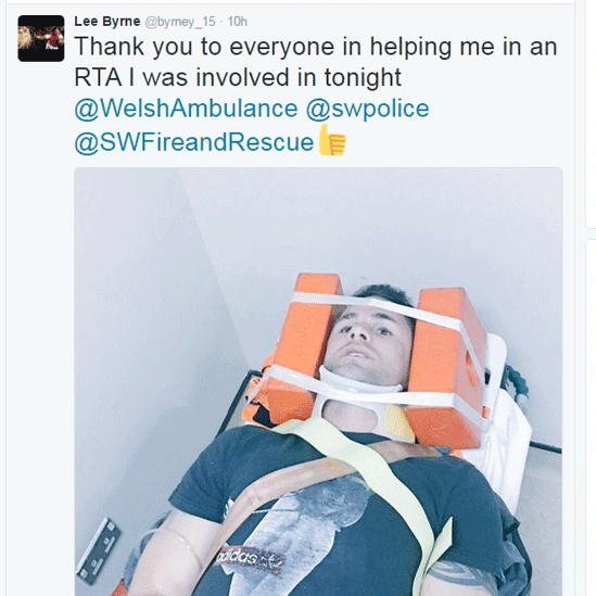 Lee Byrne tweeted a photograph of himself lying on a stretcher