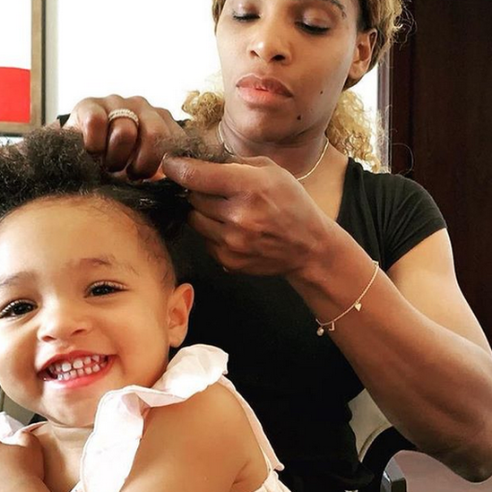 Serena Williams plaiting her daughter Olympia's hair