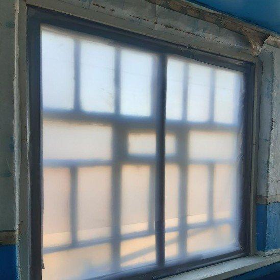 Temporary window installed in Ukraine home