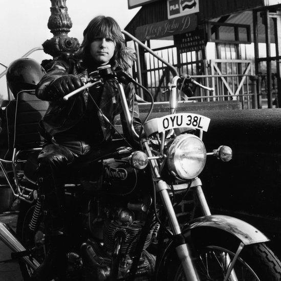 Keith Emerson riding his motorcycle at Cadogan Pier, London, March 21st 1973.