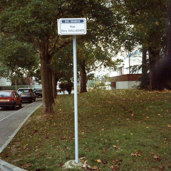 The tributes are not confined to Ireland - four months after his death, the small French town of Ris-Orangis, outside Paris, renamed the street in front of its music venue Rue Rory Gallagher