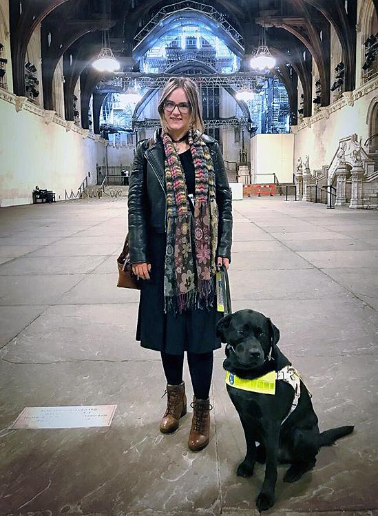 Kirsty with Bass at Westminster where she gave a speech at an event for Esme's Umbrella - a charity that raises awareness about Charles Bonnet Syndrome - November 2017