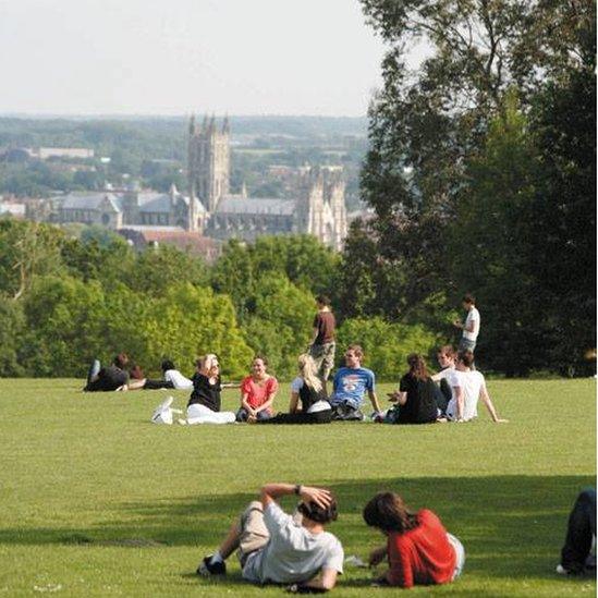 View of Canterbury Cathedral with students in foreground