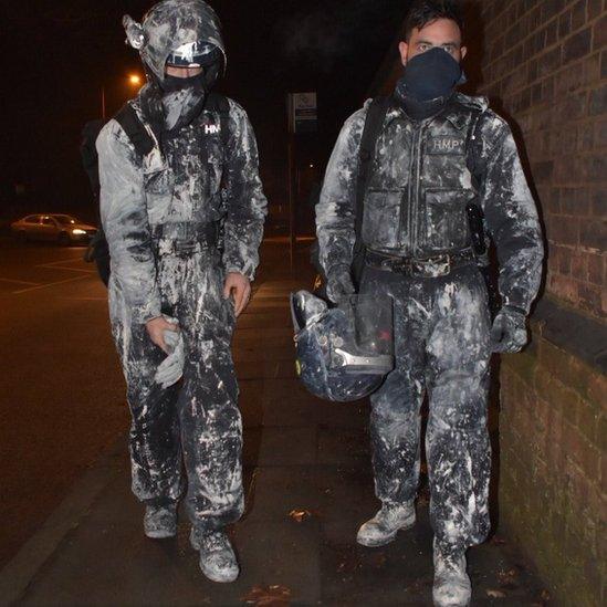 Tornado officers leaving the jail