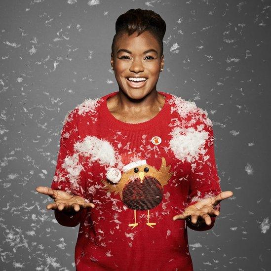 Olympic medal winner Nicola Adams wearing a Christmas jumper.