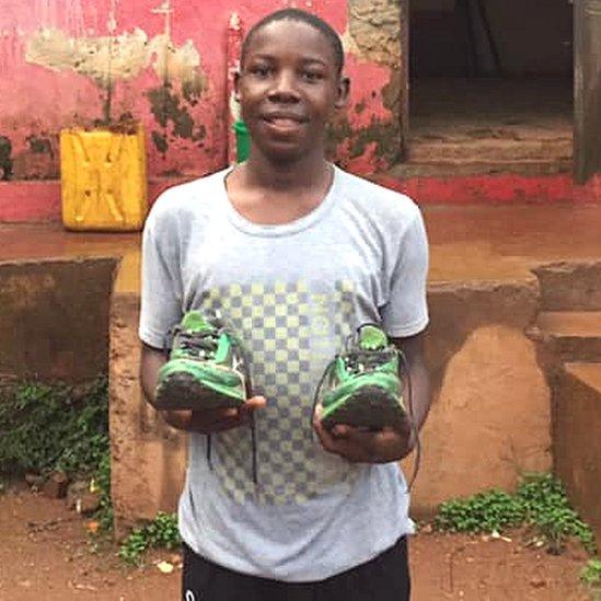 Boxing club member with shoes