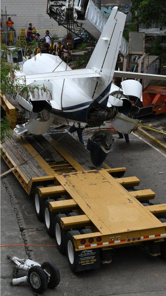 The aircraft went off the runway and collapsed over a busy boulevard while landing at Toncontin International airport in Tegucigalpa