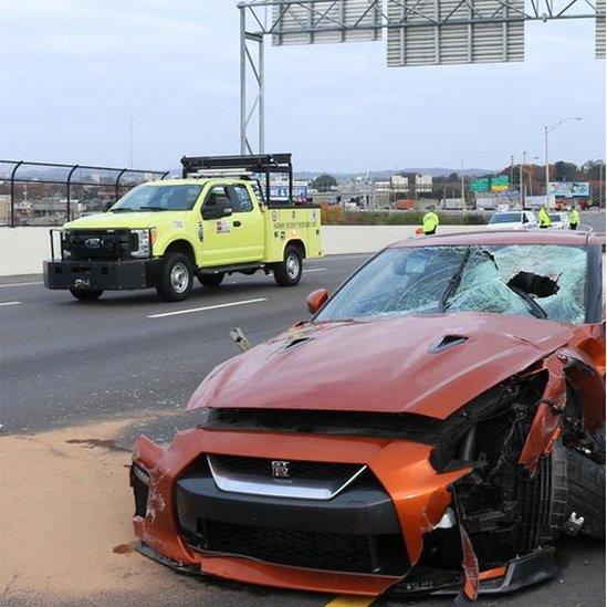 Image of car with windshield smashed through