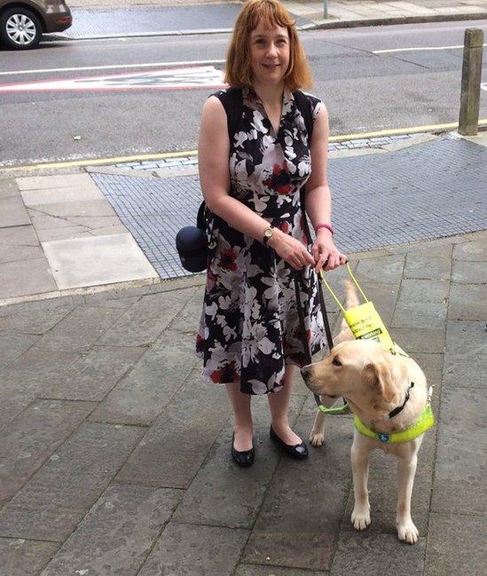 Guide dog with owner