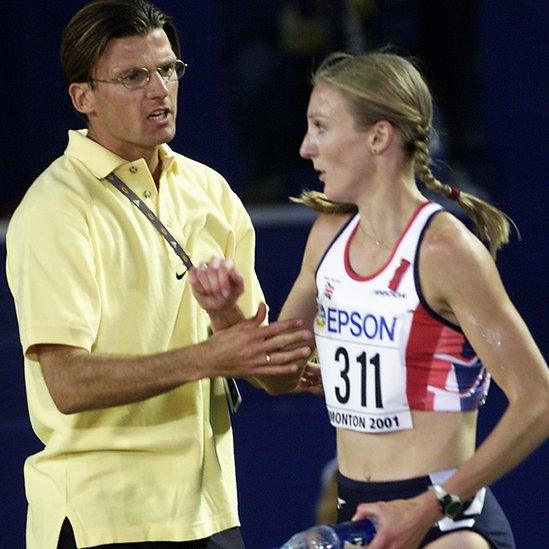 Paula Radcliffe of Great Britain is consoled by her husband Gary Lough after finishing fourth in the Womens 10,000 meters Final during the 8th IAAF World Championships held on August 7, 2001 in Edmonton, Alberta, Canada.