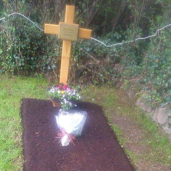 How the poet's grave looked on the first anniversary of his death