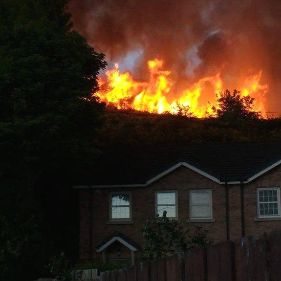 Newry fire behind homes