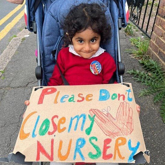 Ameira Kaur Madan with protest sign