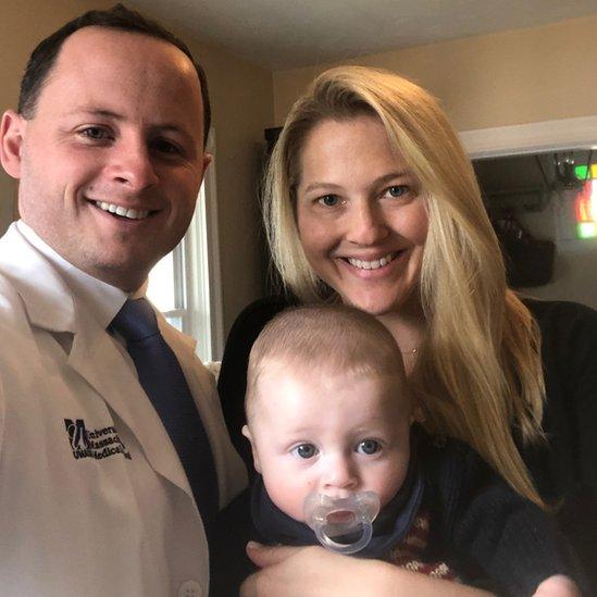 Patrick Lowe, his wife Jaclyn and son Jack, after his virtual graduation