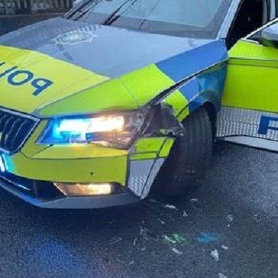 POLICE CAR DAMAGED