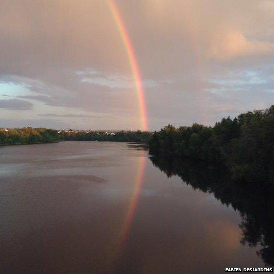 Rainbow over water in Canada