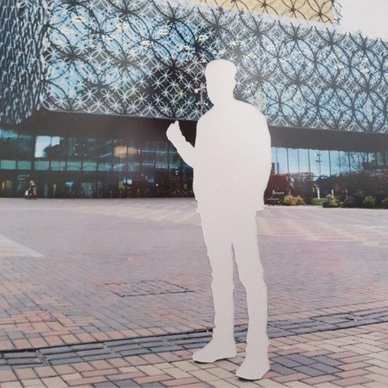 Hassan outside Birmingham Library