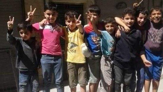 picture of children standing on a bomb