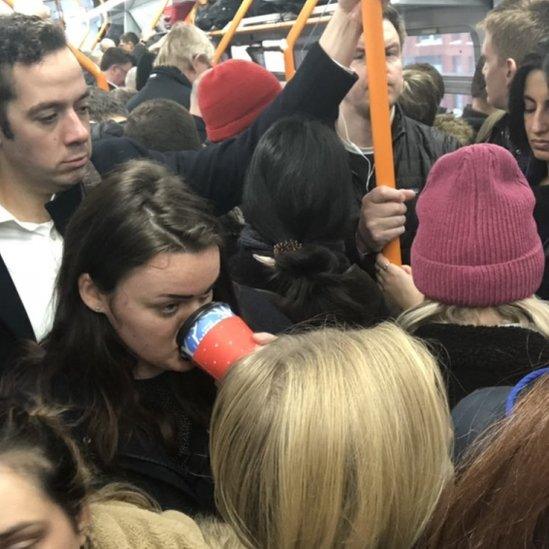 Passengers in Guildford - Waterloo train