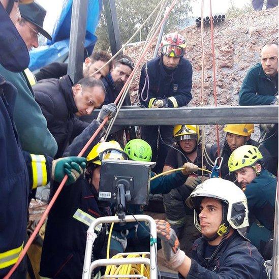 A handout photo made available by the Andalusian Government shows rescue teams working at the borehole where two-year-old boy Julen fell into back on 13 January