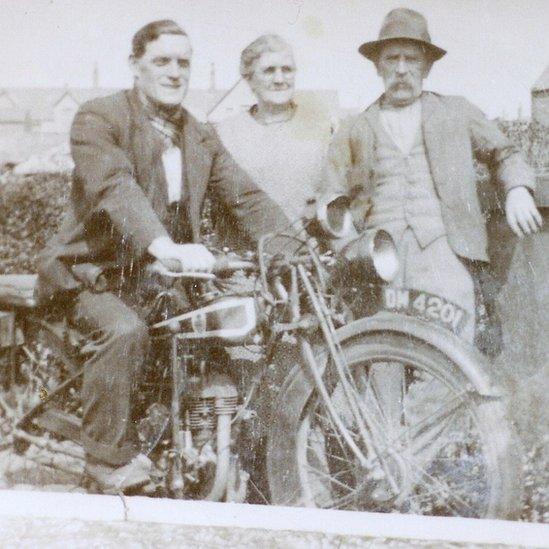 Owen Roberts pictured with his parents