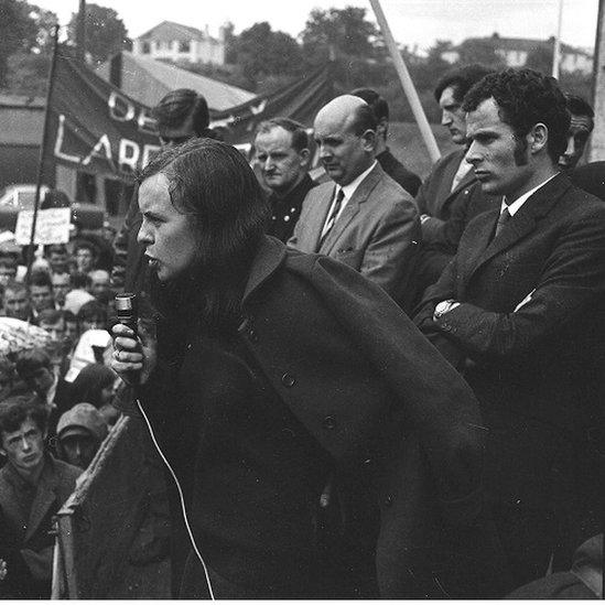 Bernadette Devlin, addressing the crowd at a civil rights march in Derry in 1969, alongside Eamonn McCann