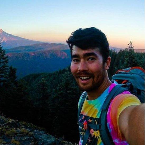 John Chau near a mountain