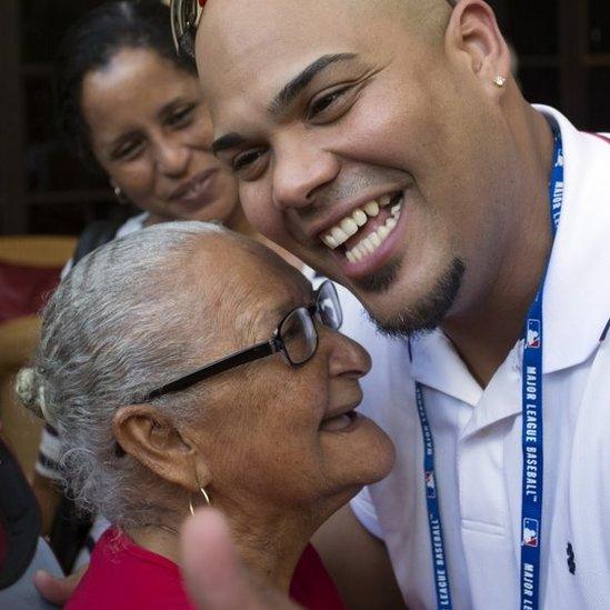 St. Louis Cardinals catcher Brayan Pena reunites with his grandmother Rosa de las Nives, 85, at the Hotel Nacional in Havana, Cuba, Tuesday, Dec. 15, 2015.